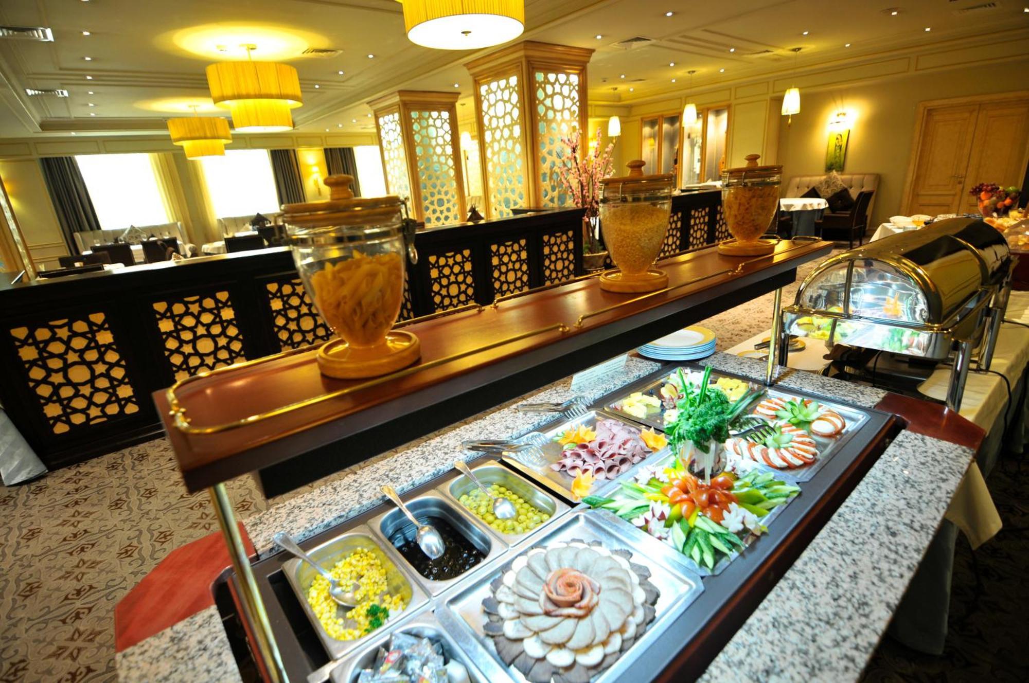 Grand Tien Shan Hotel Алматы Ресторан фото